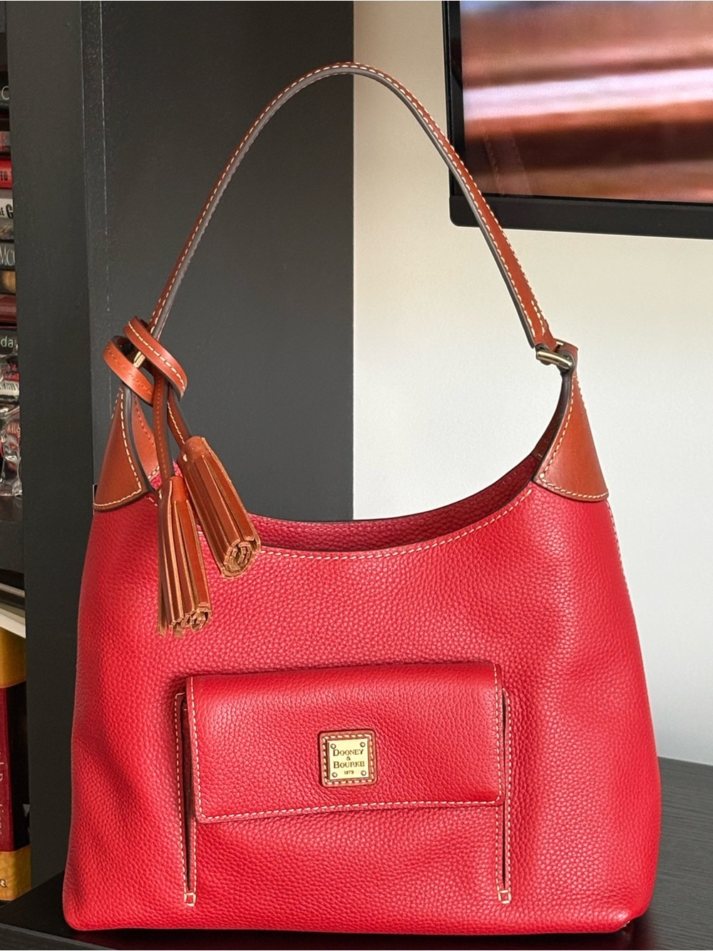 Dooney & Bourke Red Pebbled Leather Shoulder Bag with Tan Trim and Tassel